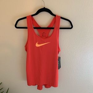 Pink / coral Nike workout top